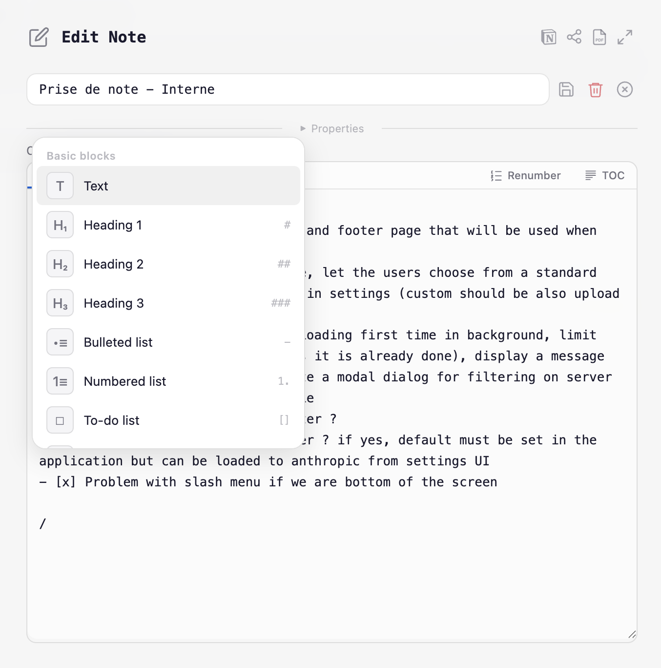 Markdown editor with slash command menu showing block types